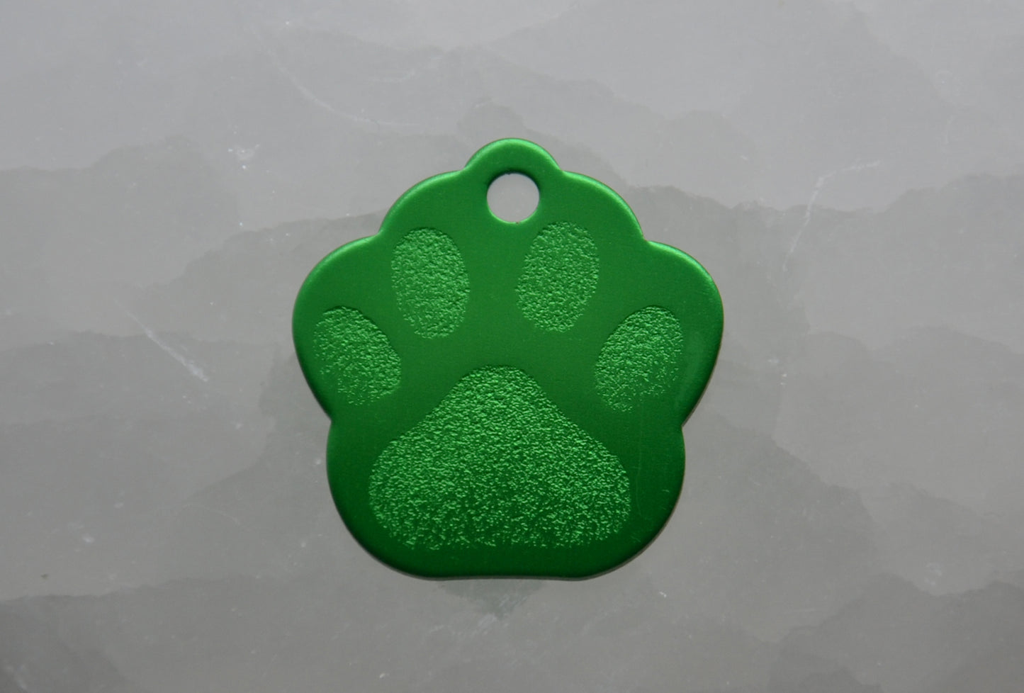 Identifikačný štítok - zelená labka.