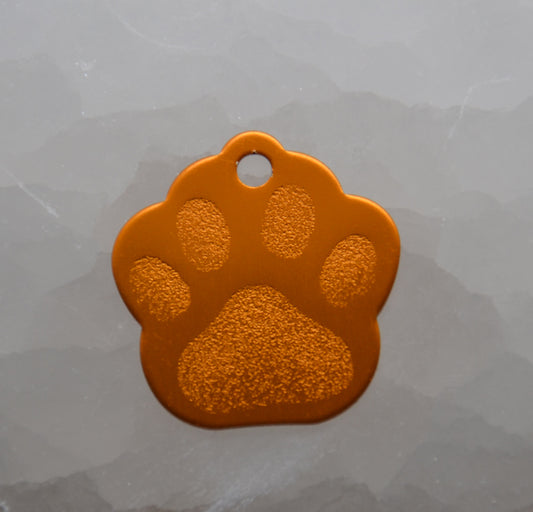 Identifikačný štítok - oranžová labka.